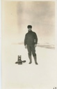 Image of Donald B. MacMillan standing on ice foot